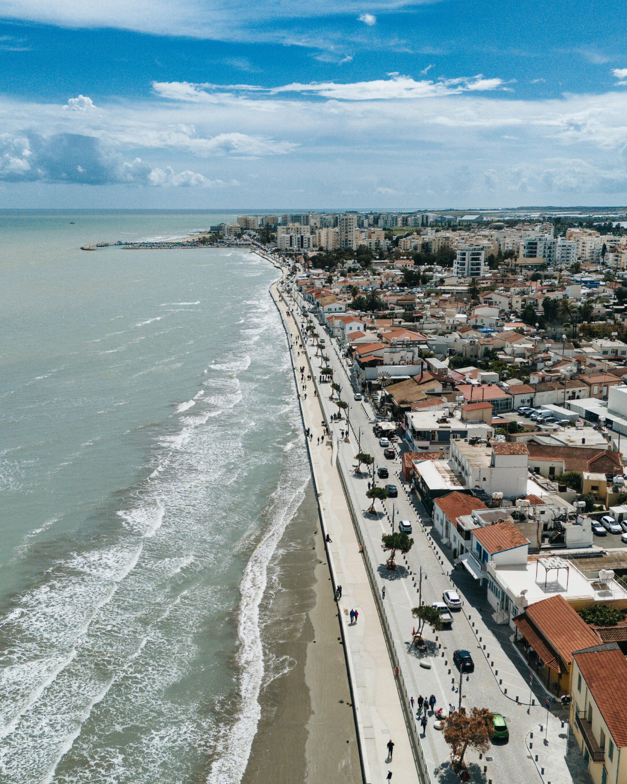 Aerial view of the Larnaca seafront promenade and coastline beside the city, Cyprus